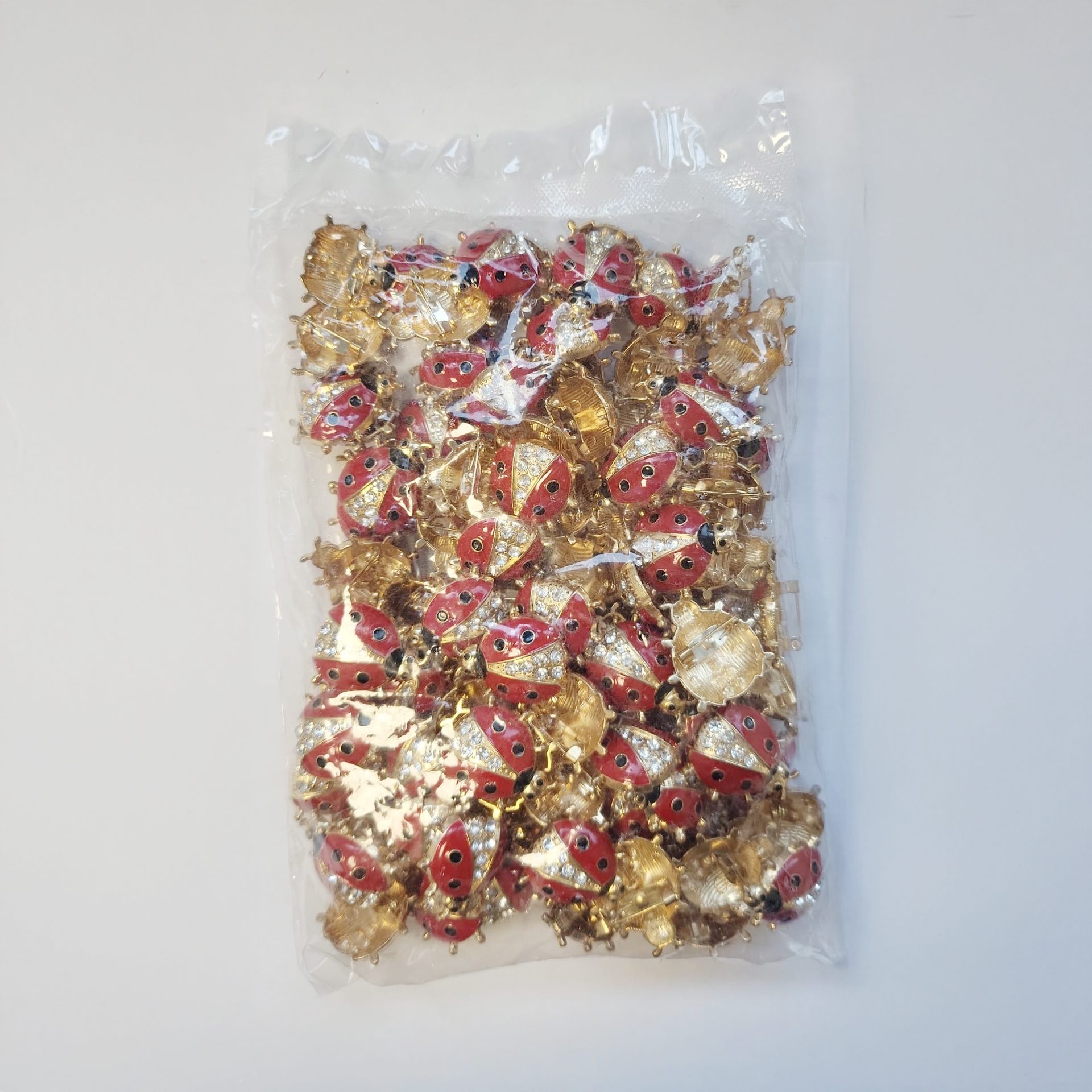 Set 100 Brose cu Pietre, Flippy, Model Buburuza cu Pietre, 2 x 2.5 cm per unitate, Auriu/Rosu