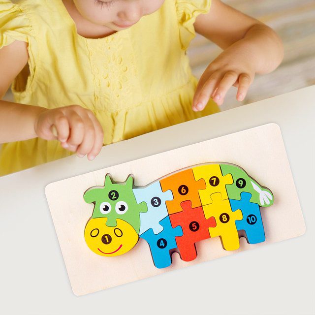 Detaliu piese puzzle lemn Flippy vacuță