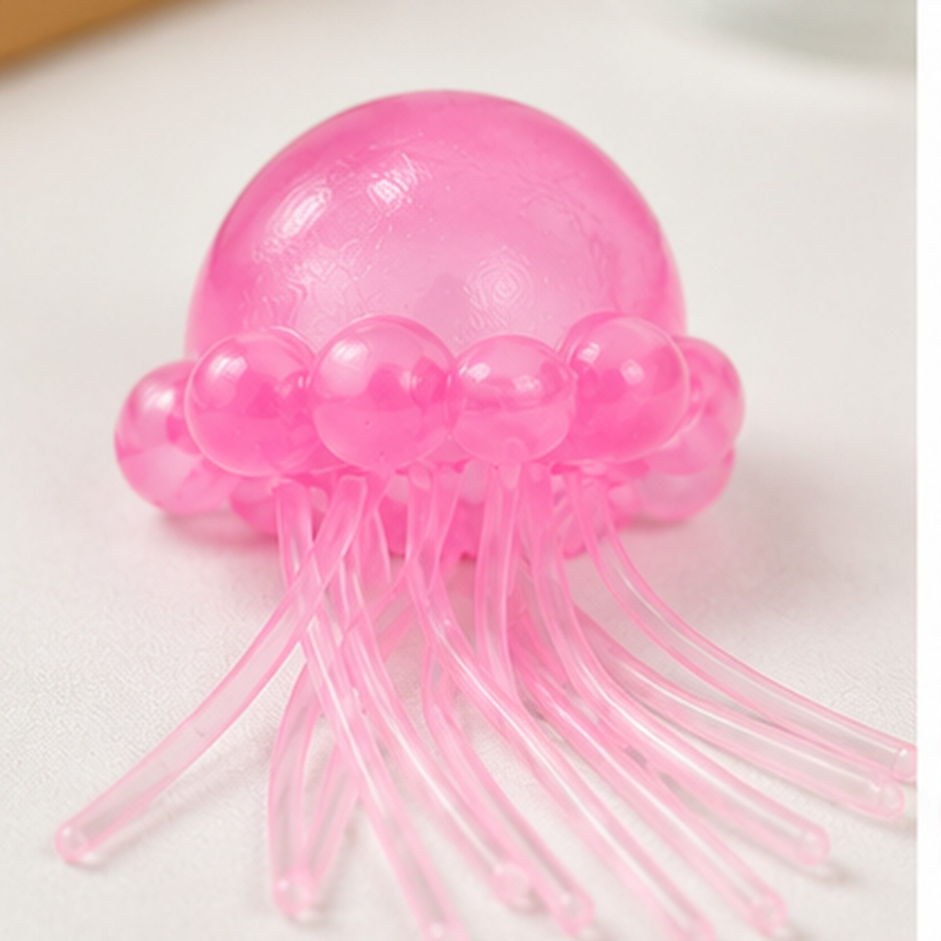 Jucarie Squishy Dumpling in Forma de Meduza, Flippy, Antistres Senzoriala Comprimabila cu Revenire, 100 g, Roz
